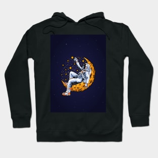 An astronaut sitting on the moon and catch stars Hoodie